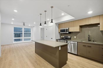 Bright kitchen and brown cabinetry4